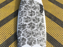 Load image into Gallery viewer, RSPro HexaTraction Camo Edition on a DHD surfboard
