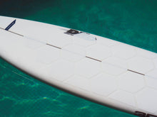 Load image into Gallery viewer, RSPro HexaTraction White edition on a DHD surfboard on a pool
